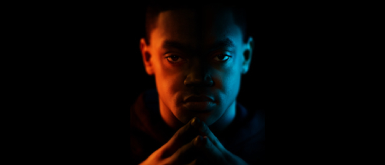 Man's face in shadows